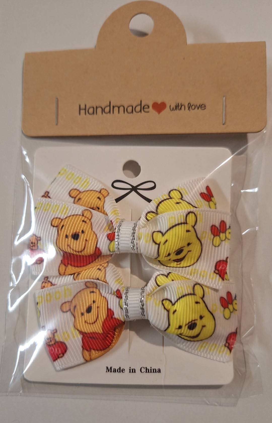 Pooh bear hairbow clip set